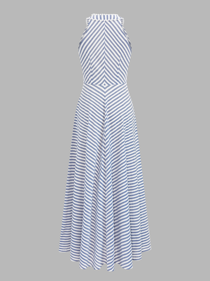Modelka w damskiej sukience midi w paski z dekoltem halter