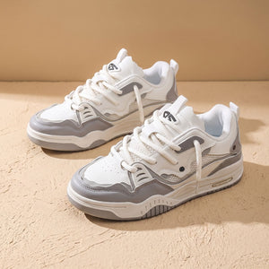 Para niskich sznurowanych sneakersów męskich biało-szarych