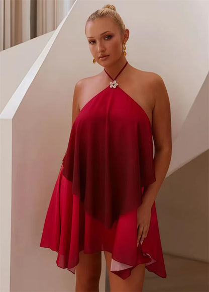 Elegancka różowa mini sukienka z falbanami i efektem gradientu