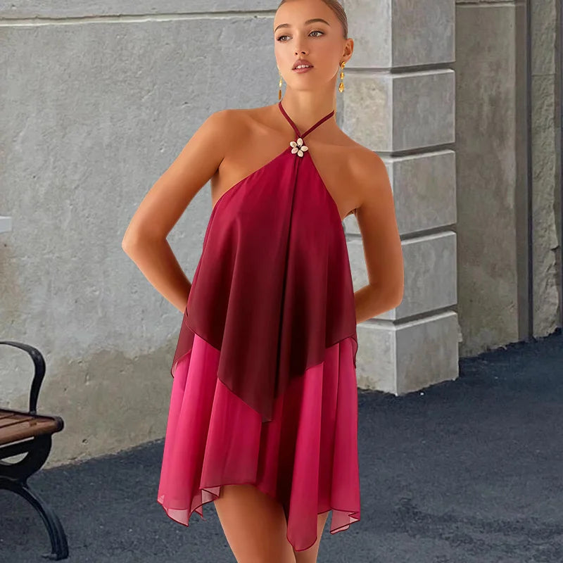 Elegancka różowa mini sukienka z falbanami i efektem gradientu