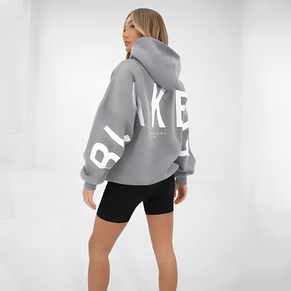 Yvette - Luźny hoodie z modnym nadrukiem dla kobiet