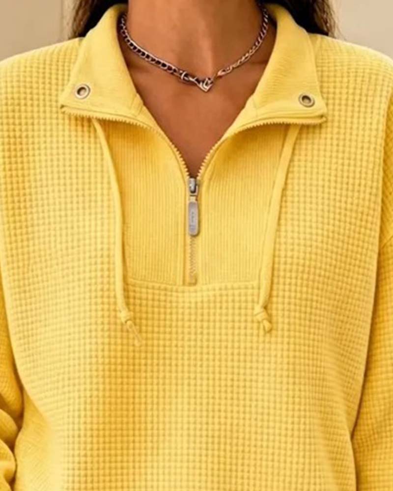 Bluza waflowa z troczkiem – detal regulacji przy dole