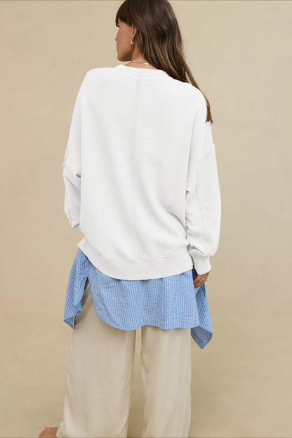 Damska bluza oversize – pełna sylwetka modelki