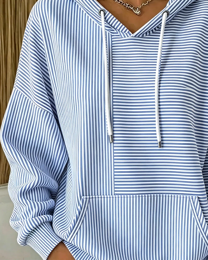Detal paskowanego materiału i ściągacza bluzy z kapturem