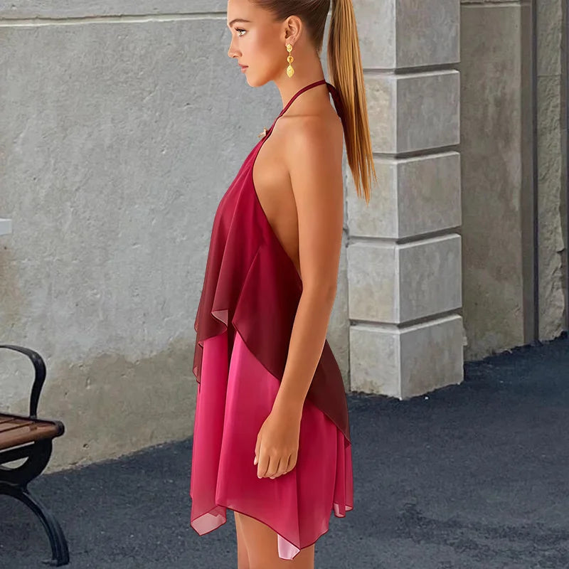 Elegancka różowa mini sukienka z falbanami i efektem gradientu