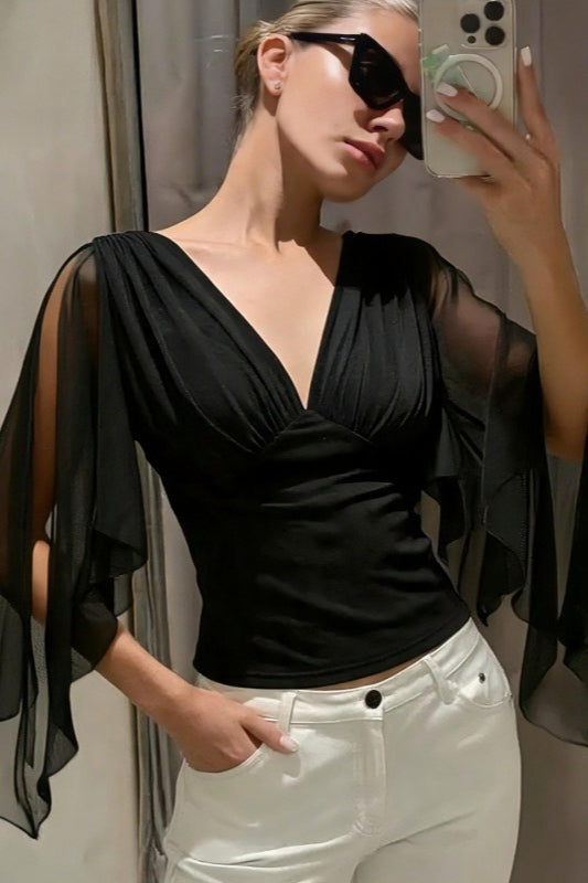 Damska bluzka z dekoltem V w eleganckiej stylizacji
