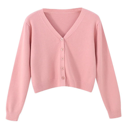 Krótki sweter damski z dzianiny z dekoltem w serek
