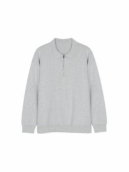 Bluza z kołnierzykiem polo prezentowana z przodu