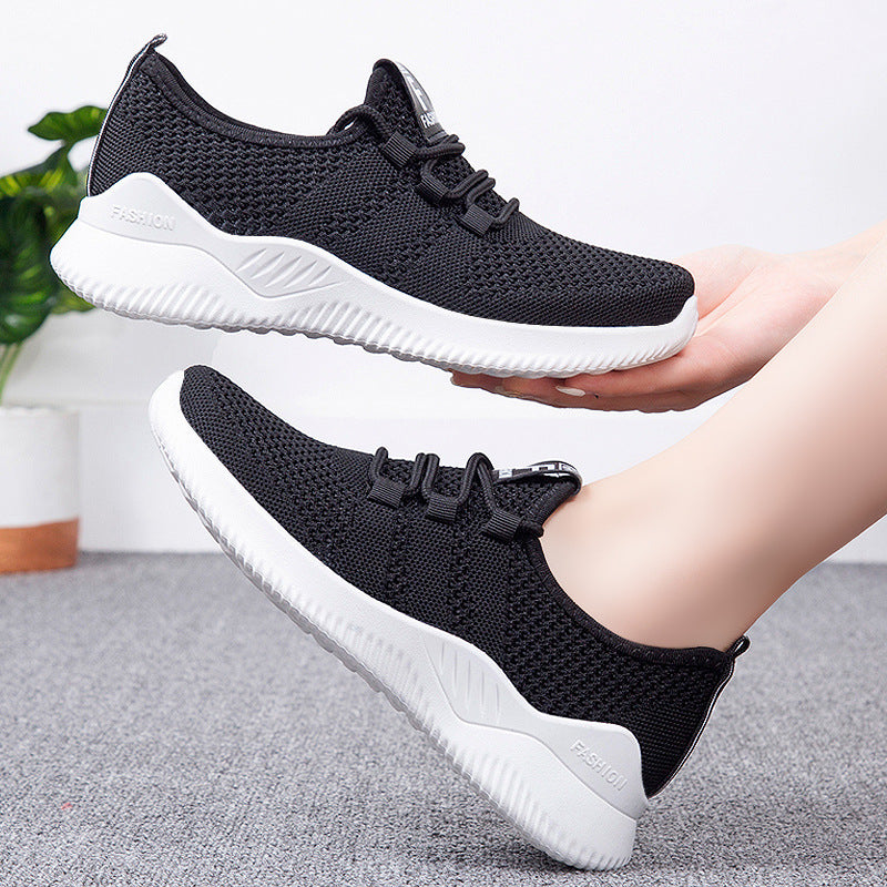 Widok z boku lekkich sneakersów uniseksowych z elastyczną cholewką