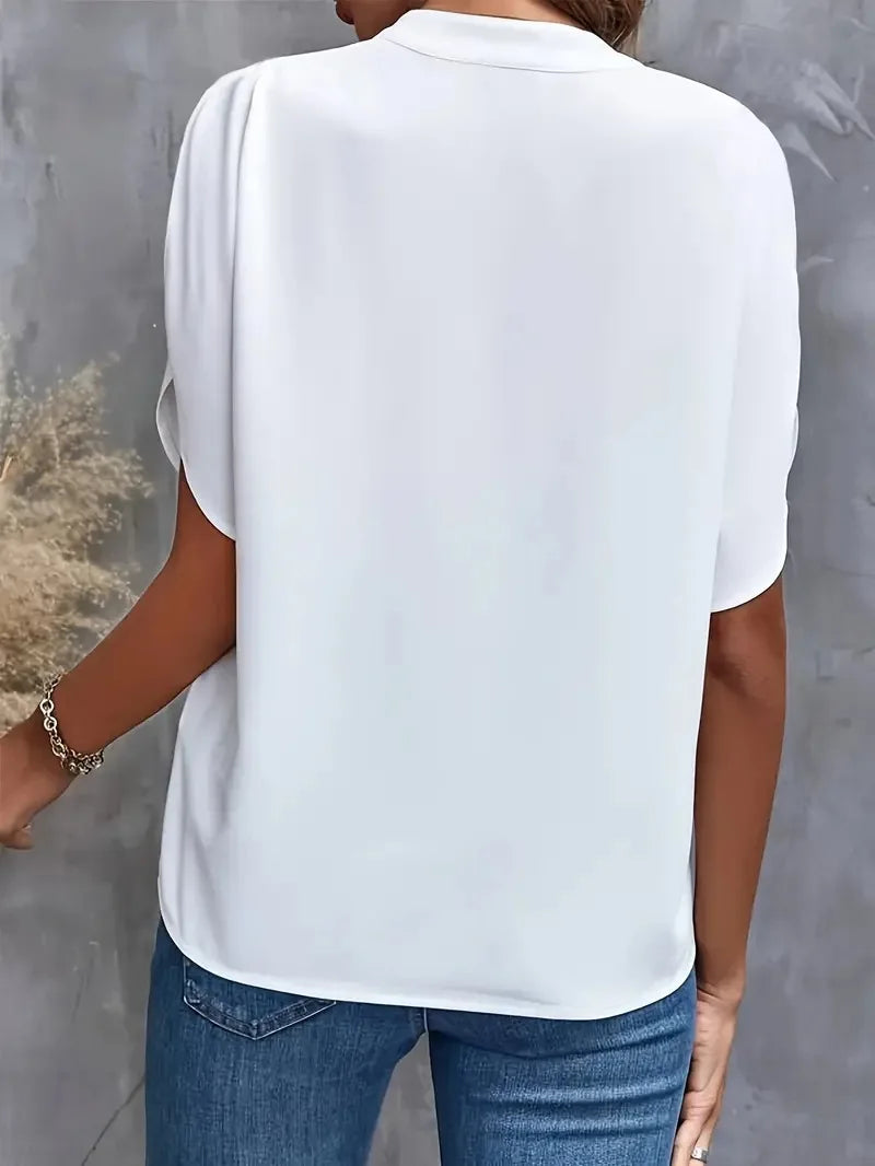 Isalie – Elegancka bluzka z dekoltem w serek, z lekkiego materiału