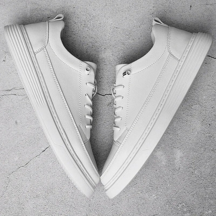 Męskie białe skórzane sneakersy niskie widok z boku