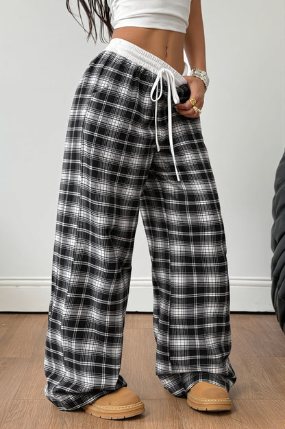 Luźne damskie spodnie wide leg w kratę do codziennych stylizacji