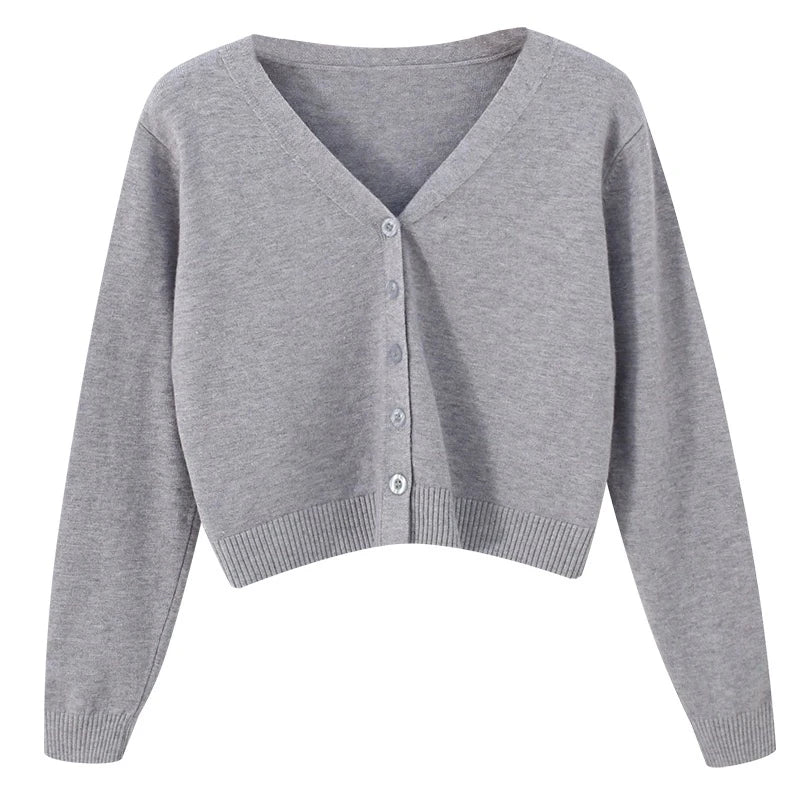 Krótki sweter damski z dzianiny z dekoltem w serek
