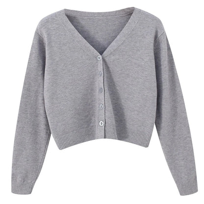Krótki sweter damski z dzianiny z dekoltem w serek