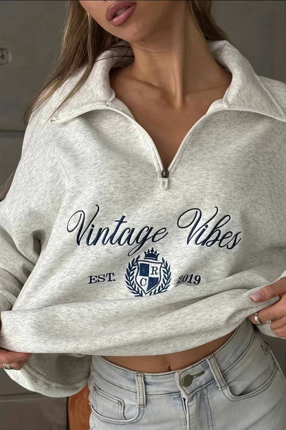 Damska bluza oversize w stylu vintage z zamkiem pod szyją widok z przodu